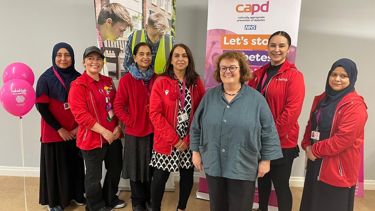 Clare Miller meeting the Saheli Hub team