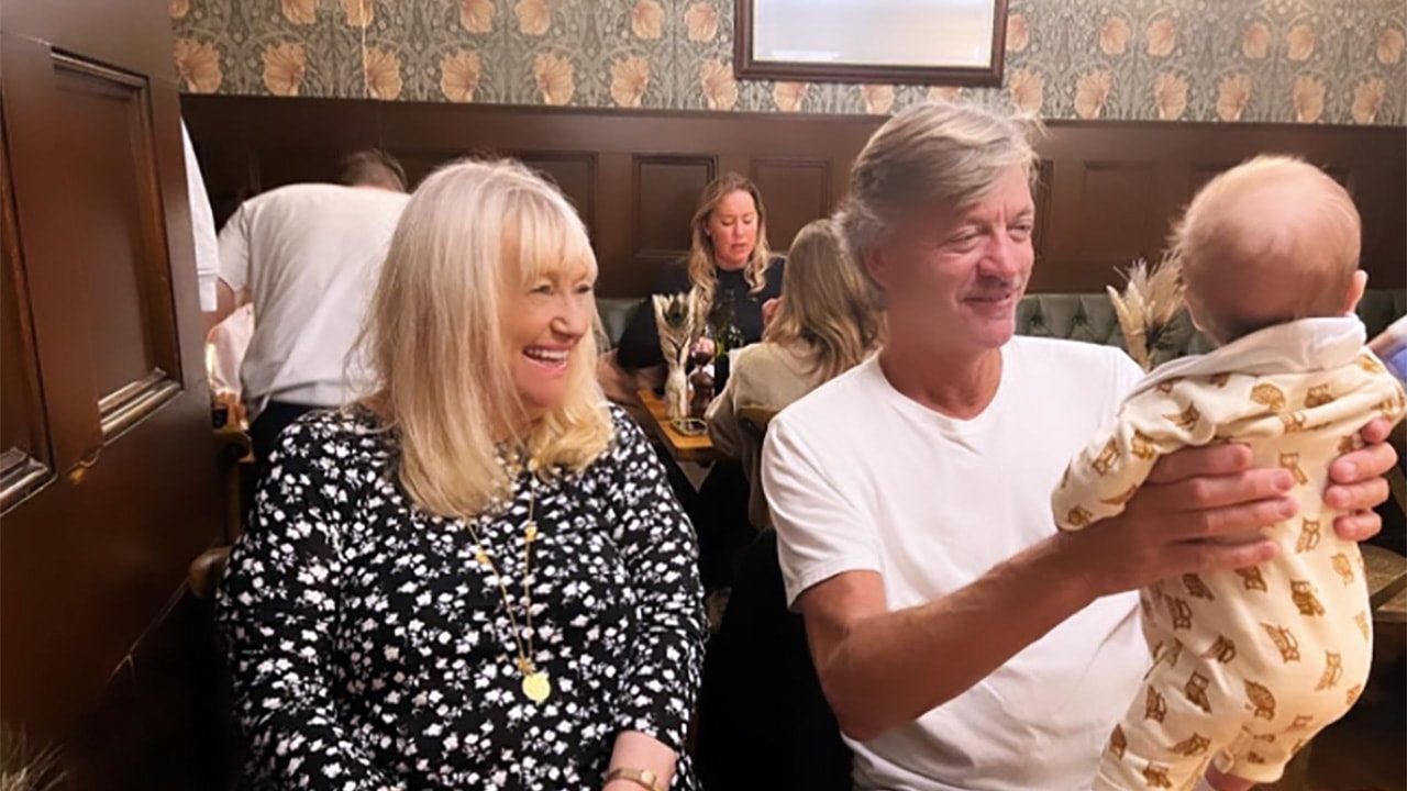 Richard Madeley and Judy Finnigan with baby