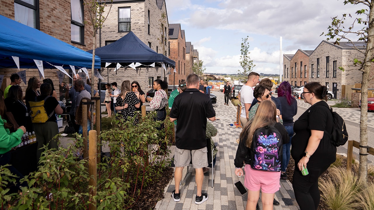 Launch party in the street at Barne Barton, following the completion of the first houses