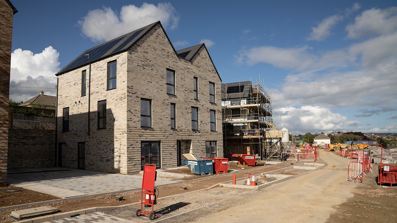 Almost completed street of maisonettes at Barne Barton Regeneration in Plymouth